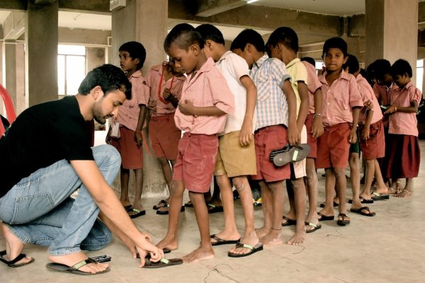 Shriyans donating shoes